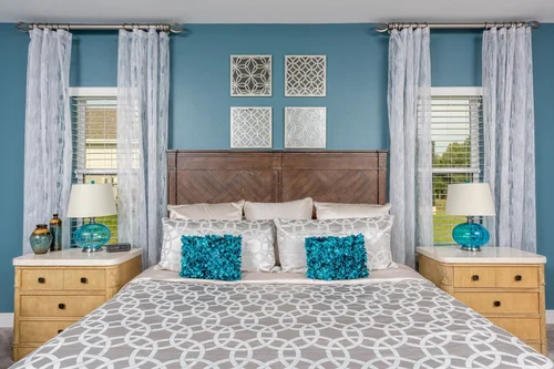 Bedding & Pillows, Coordinated custom bedding and throw pillows that complete a finished bedroom. By Custom Fabric Creations, St. Petersburg, FL.