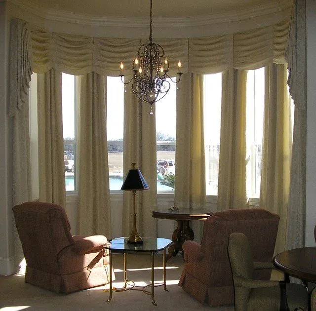 Custom swag valance and drapery on a bay window by Custom Fabric Creations in St. Petersburg, FL