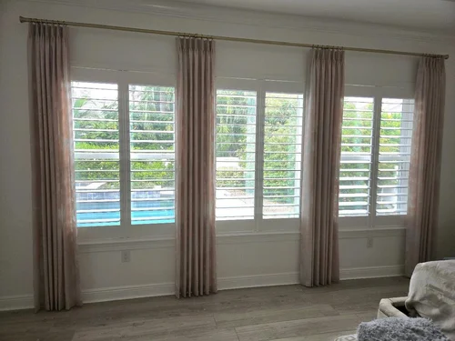 Mauve Drapery on Gold Hardware, Soft mauve drapery panels on warm gold rods, tailored to the window for a refined, layered look. By Custom Fabric Creations, St. Petersburg, FL.
