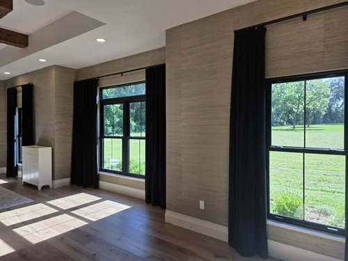 Nailhead-Trim Blackout Drapes, Modern blackout drapery finished with nailhead trim in a custom designer fabric for full light control. By Custom Fabric Creations, St. Petersburg, FL.