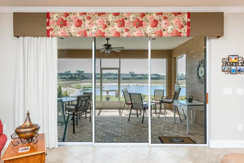 Outdoor Window Shades, Exterior shades that tame sun and heat on a lanai while keeping the outdoor view. By Custom Fabric Creations, St. Petersburg, FL.